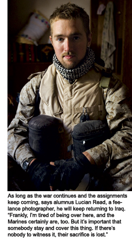 A thoughtful Lucian Read sits in full military gear, his helmet removed and resting on his lap.
