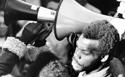 Photo of Danny Glover with a megaphone during the 1968 student strike.