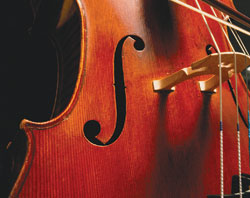 Close-up image of a cello and link to String Theory story