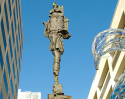Photo of statue titled "Man with Flame" and link to Creative Statements story