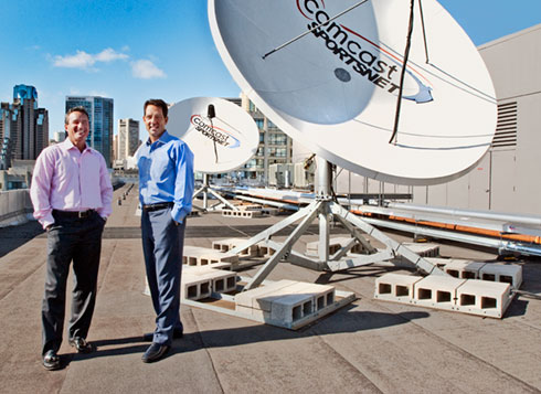 Photo of Dennis O'Donnel and Tedd Griggs hanging out on top of the Comcast Sportsnet building.