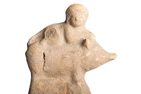 Etruscan terra-cotta statuette used as a baby's rattle. Photo by Paul Asper