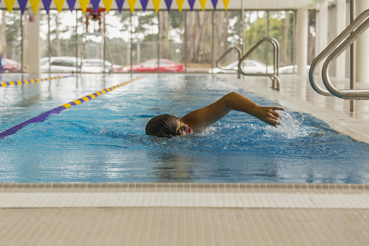 A student trying out the new pool at the Mashouf Wellness Center