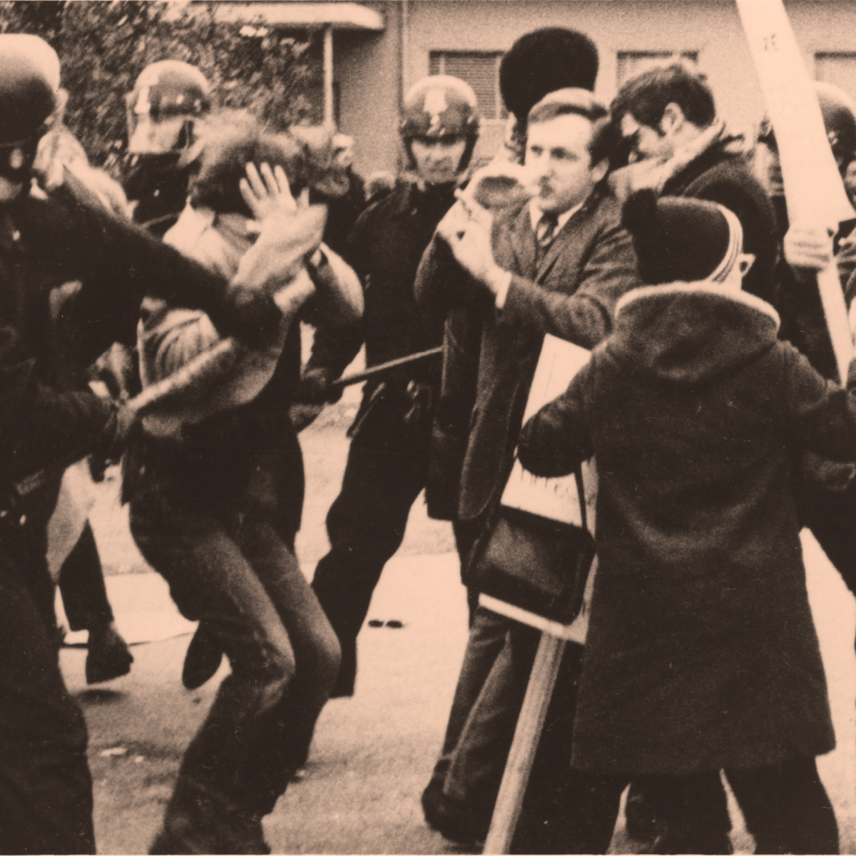 Vintage SFSU protestors holding up signs