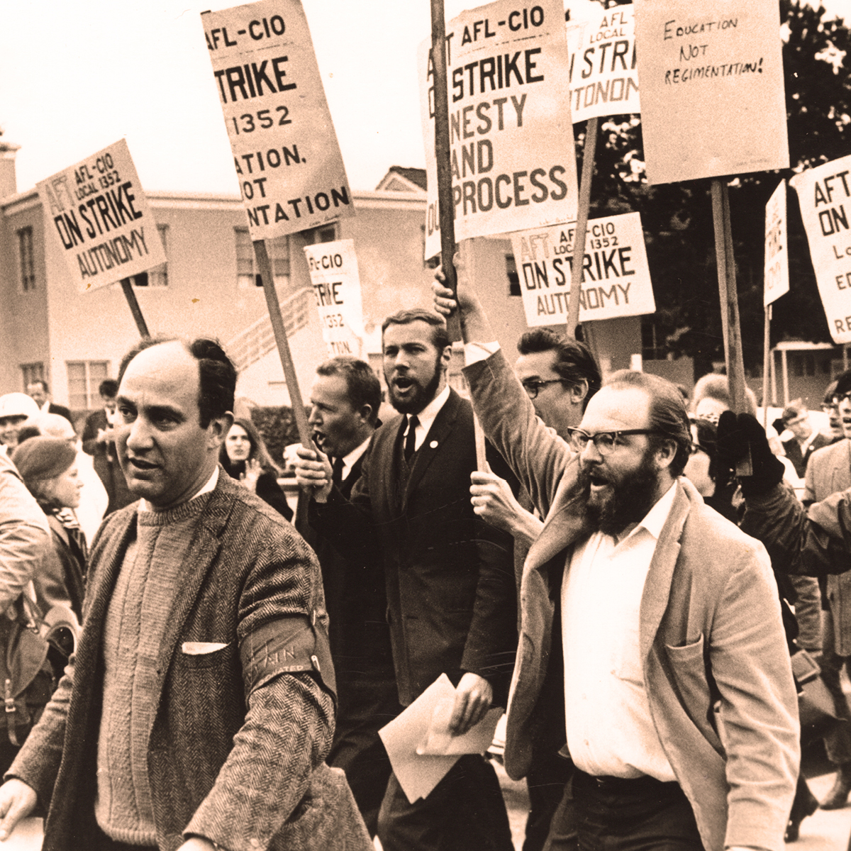Vintage SFSU protestors holding up signs