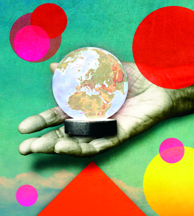 Illustration of world on a hand with colorful shapes in background
