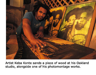 Artist Keba Konte sanding a piece of wood at his Oakland studio alongside one of his photomontage works which features the photos of two young boys.