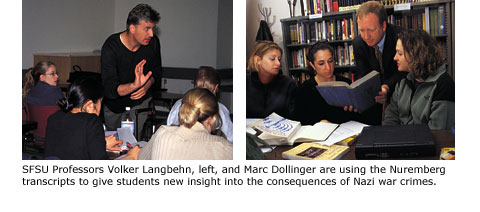 German Professor Volker in left picture Langbehn teaching. He's standing in a row between his students’ desks where they sit and watch him speaking and gesturing with his hands. Jewish Studies Professor Marc Dollinger in right picture shows one of the blue books containing the Nuremberg Trials transcripts to his students. Andi Goldfarb, Rachelle Levey and Elaine Hesselroth look inside the book he’s holding open for them.