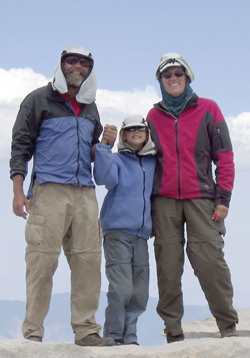 Photo of the Egbert family atop a mountain.
