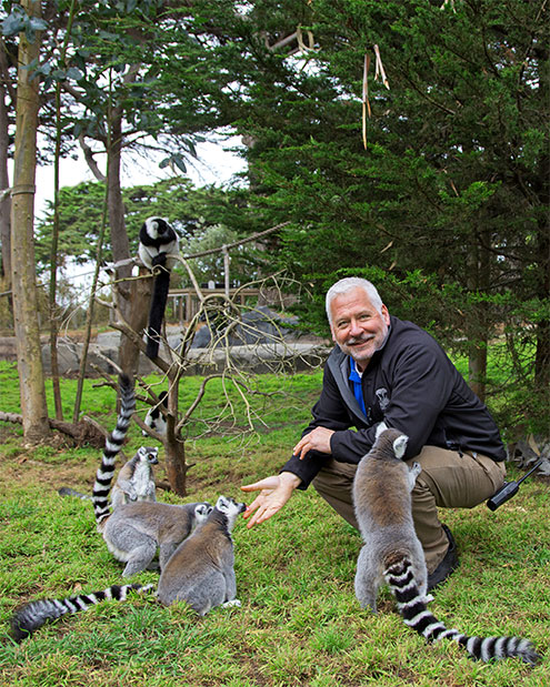 Photo of David Bocian with some lemurs.