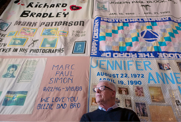Cleve Jones, more recently he paused to reflect before a section of the AIDS Memorial quilt