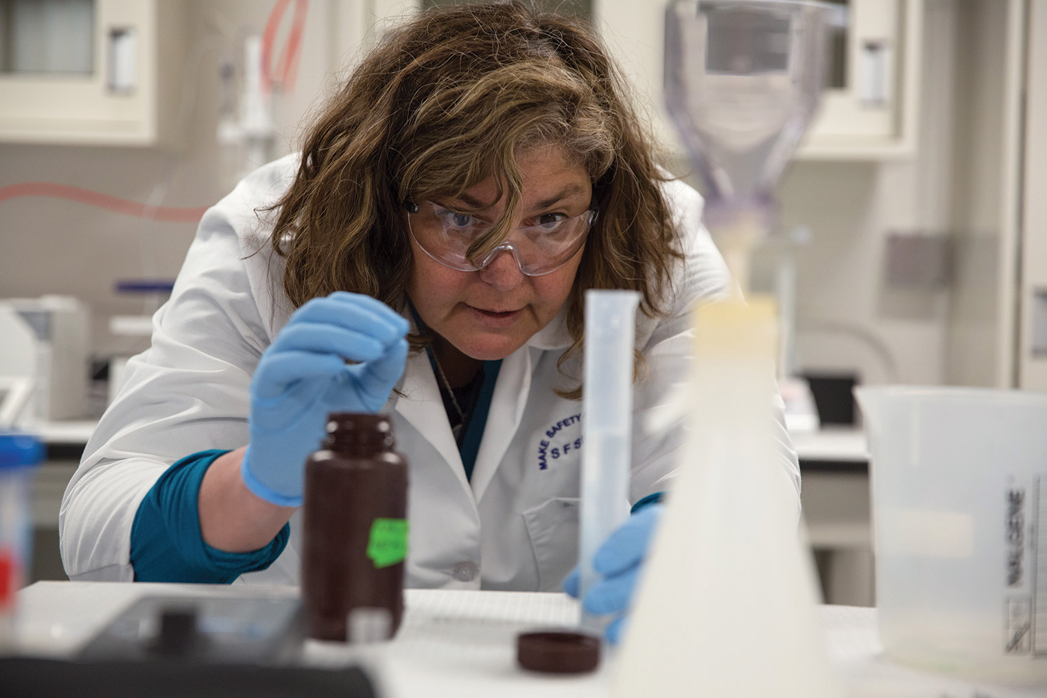 EOS Director Karina Nielsen gets hands-on with samples in the lab.