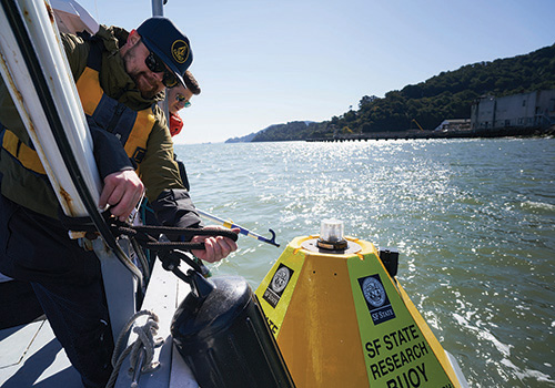 OSC member collecting samples from the San Francisco Bay.