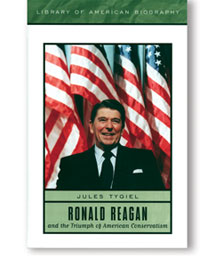 The cover of Jules Tygiel’s book on Reagan, featuring the late 40th president smiling in front of an American flag