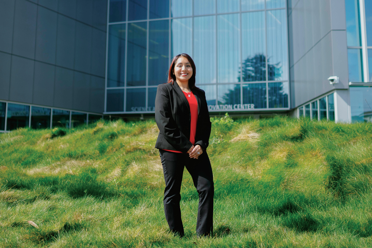 Leslie Valencia in front of the new Science and Engineering Inovation Center