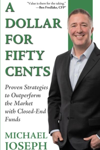 book cover featuring a man in a suit (Michael Joseph)