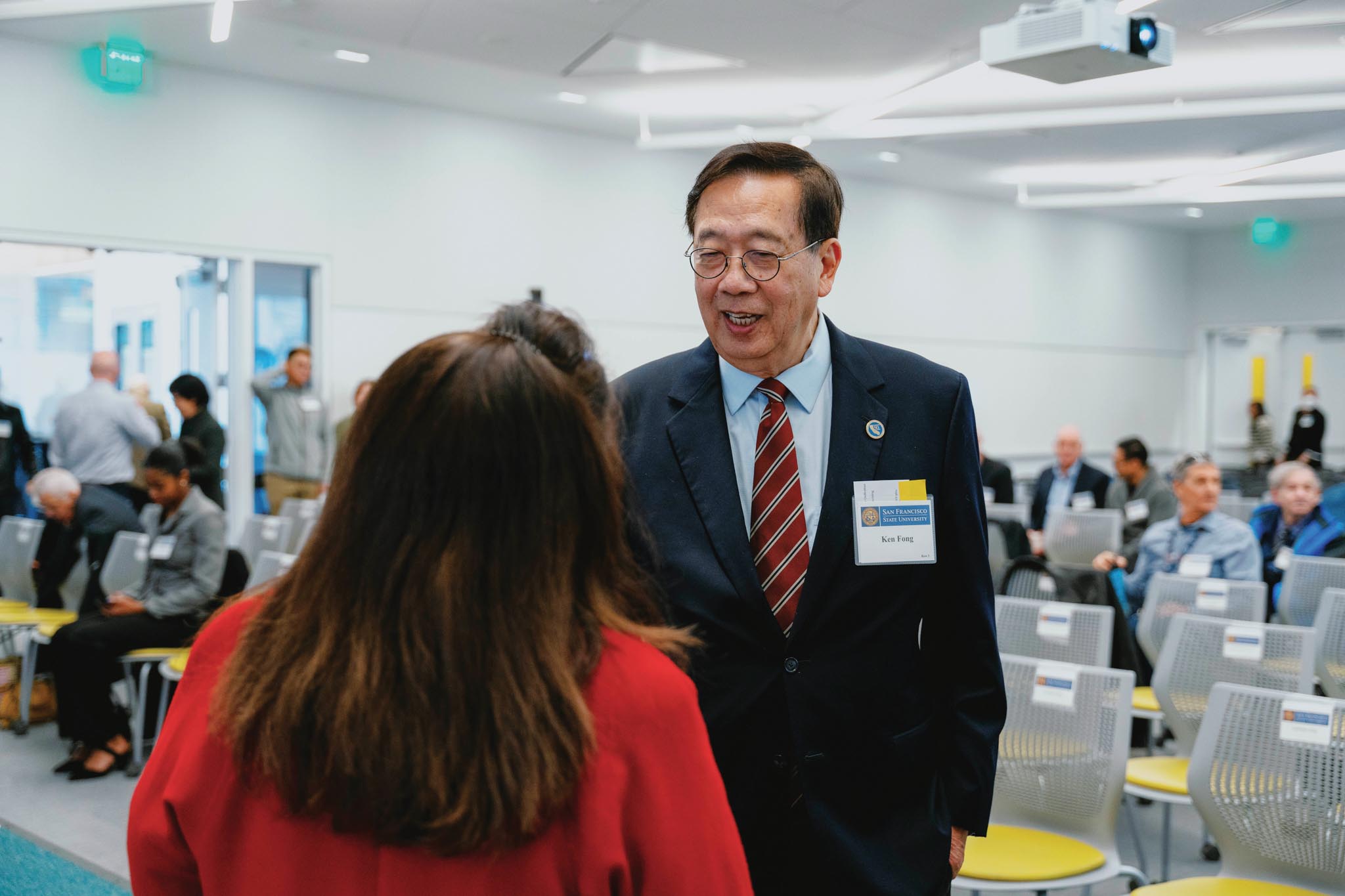 Alumna Kenneth Fong networking during SFSU's opening ceremony for the Science and Engineering Innovation Center