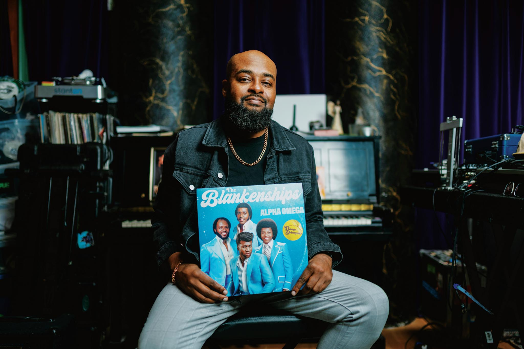 Mike Blankenship holding up The Blankenships Vinyl