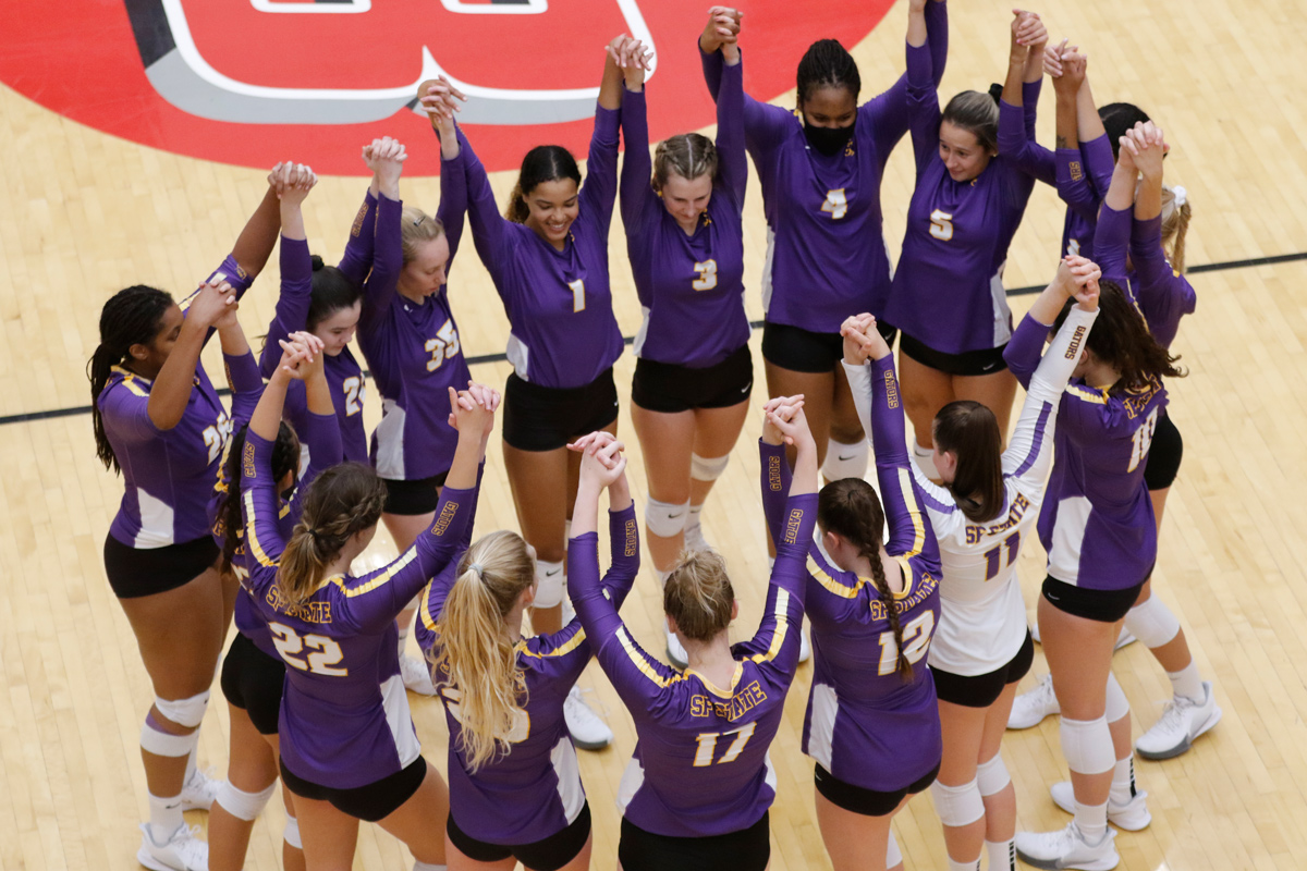 Women's volleyball team cheering