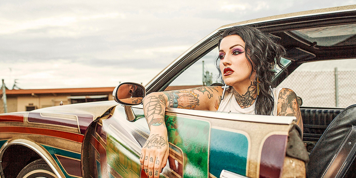 Woman in low rider car