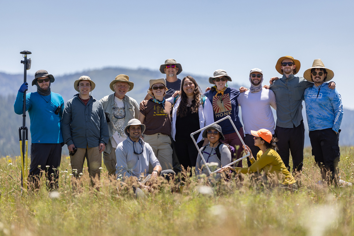 a group of smiling researchers at the Sierra Nevada Field Campus