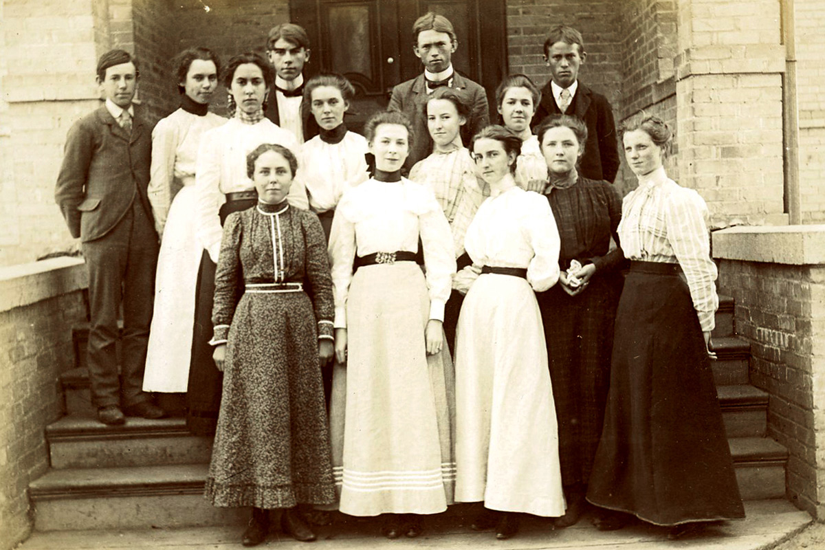 a photograph of the 1900 in sepia showing the first students of SFSU: 10 women and 4 men