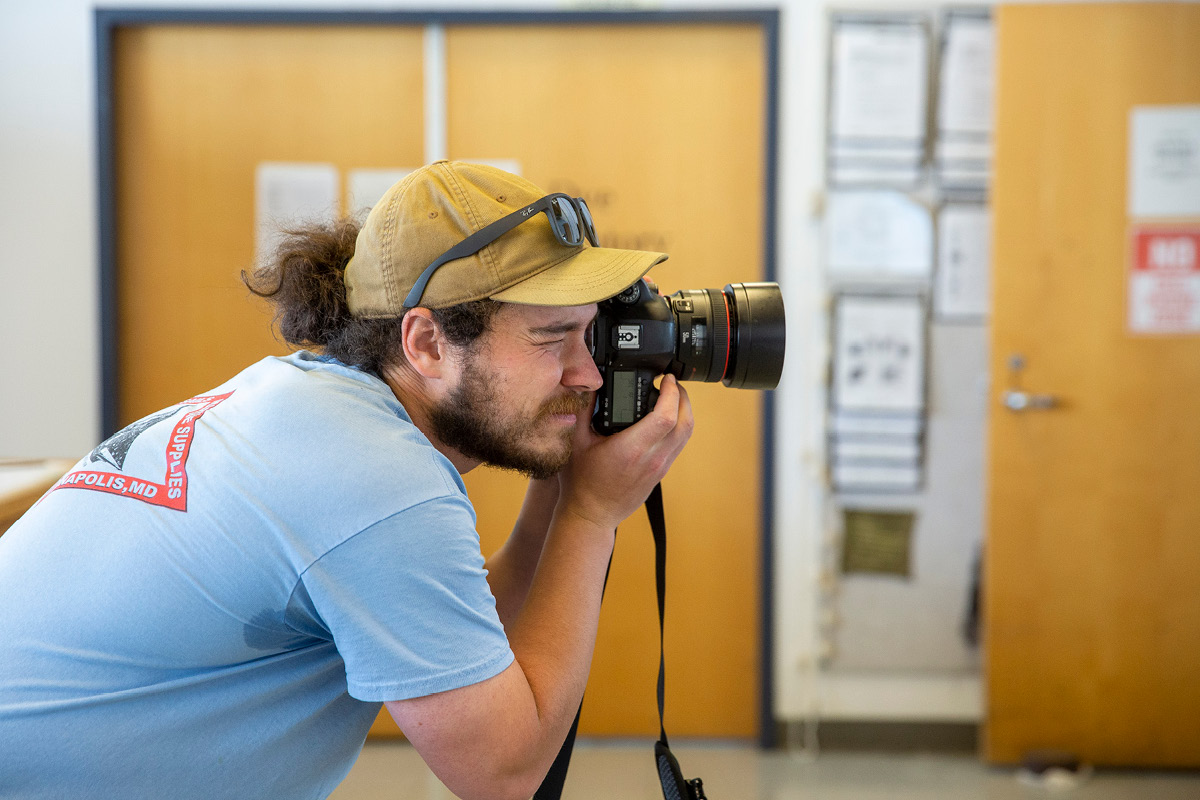 Benjamin Fanjoy holding a camera