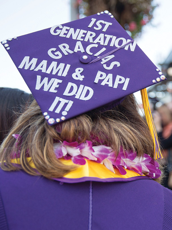 A purple mortarboard saying '1st generation gracias mami & papi we did it'