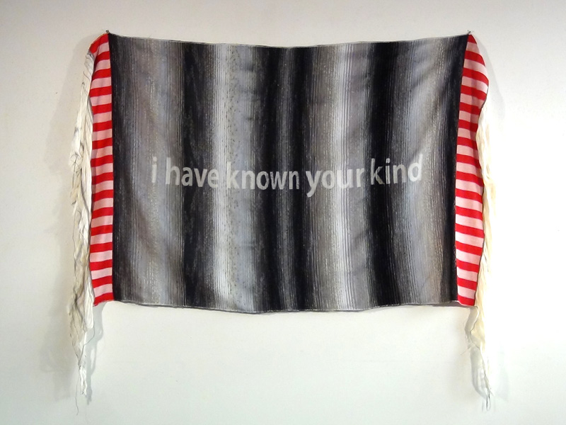 Art Piece: Black and white flag with text 'i have known your kind'